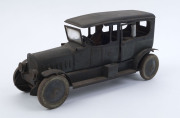 LARGE WIND-UP LIMOUSINE: lithographed tinplate car by Distler (Germany), with green body, black roof, intact running boards, and uniformed driver, two opening doors; c.1920s, length 30cm, height 15cm. - 4