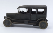 LARGE WIND-UP LIMOUSINE: lithographed tinplate car by Distler (Germany), with green body, black roof, intact running boards, and uniformed driver, two opening doors; c.1920s, length 30cm, height 15cm. - 5