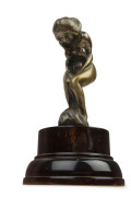 A cast bronze female nude car mascot on later wooden base, circa 1920s, ​19cm high overall - 2