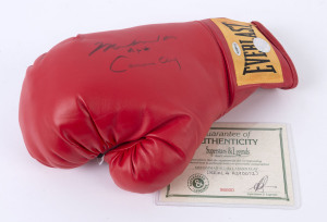 MUHAMMAD ALI: 'Everlast' 14oz boxing glove signed "Muhammad Ali AKA Cassius Clay", with Superstars & Legends CofA numbered #96600.