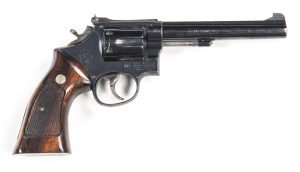 SMITH & WESSON 17-2 R/F REVOLVER: 22LR; 6 shot fluted cylinder; 149mm (5 7/8") barrel; vg bore; standard sights; S&W & Cal markings to barrel; S&W Trade mark & address to rhs of frame; sharp profiles & clear markings; retaining 97% original blue finish; c