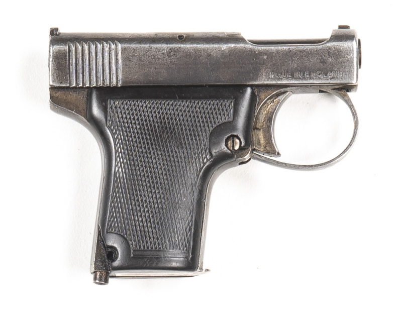 ENGLISH WEBLEY & SCOTT VEST POCKET S/A PISTOL: 25 ACP; 6 shot mag; 45mm (1¾") barrel; g. bore; standard sights, slide address & markings; g. profiles & clear markings; blue/grey finish to slide, plum to frame & t/guard; p. vulcanite grips with a lrg chip