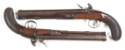 CASED PAIR OF JOSEPH MANTON FLINTLOCK HALF STOCKED DUELLING PISTOLS: 50 Cal; 10" octagonal barrels with small areas of light bruising & one pistol has light vice marks to the breech; g. bores; small silver blade front sights & notched rear sights at the t - 2