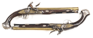 WILSON LONDON MATCHED PAIR OF FULL STOCKED SILVER MOUNTED HOLSTER PISTOLS: 650 Cal; 10" brass barrels with cannon shaped muzzles; f. bores; barrels inscribed WILSON LONDON & marked with The Gun Maker's Company London proofs & R.W; stepped brass lock plat