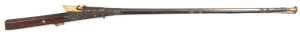 INDIAN TORADOR MATCHLOCK MUSKET: 22 bore; 47½" round watered steel barrel with gold damascene to flared muzzle & to breech areas, integral pan with enfolding cover; standard serpentine type lock with ornate trigger & side plates of nielloed steel; g. cond