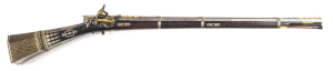 BALKAN MIQUELET RIFLE: .65 Cal; 29¾" octagonal damascus barrel with inlaid thick gold floral designs to muzzle & breech, breech tang sight with gold inlay; f to g. bore with 9 grooves; lock of traditional form fully endowed with gold inlay, crisp action; 