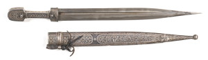 SOUTHERN RUSSIAN CAUCASUS KINJIL: vg cond 15½" blade with deep offset fullers & minor discolour spots near tip; hilt worked entirely in niello with one face & both side gold washed in addition; scabbard also worked entirely in niello with designs & gold w