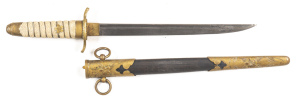 JAPANESE POST 1883 COMMISSIONED OFFICER'S NAVAL DIRK: 8 7/8" single edged blade with groove to back edge, v. light staining & fine pitting near the point; cat scratches to Habaki; brass cross guard marked with N within a diamond; vg brass mounted white sa