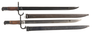 LOT X 2 TYPE 30 JAPANESE BAYONETS: VARIATION C; exc blades; one blue & one polished; both with fullers, hooked cross guards, contoured grips & bird's head pommels & scabbards.