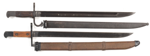 LOT X 2 TYPE 30 JAPANESE BAYONETS: VARIATION M; vg unfullered blade; straight cross guard & bird's head pommel; wooden scabbard with 2 string wrappings, short metal tip & brown paint finish. VARIATION C: g. fullered blade; hooked cross guard; contoured gr