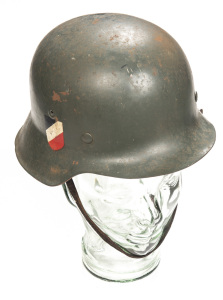 GERMAN WWII THIRD REICH M42 METAL HELMET: complete with liner & chin strap; black & white Eagle Swastika Army decal; black, white & red tri-colour decal to rhs; helmet retains 80% original khaki finish; all complete.