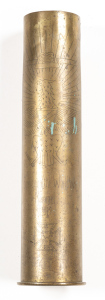 GERMAN WWI ARTILLERY SHELL CASING: 10.6cm x 50cm; casing is unpolished & in original cond; the base dated 1917; the casing inscribed with winged crest, surmounted by a Crown with an inscription souvenir of the World War Kemmel, dated 1919 & the likeness o