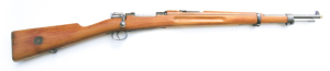 SWEDISH MAUSER MODEL 1938 SHORT RIFLE: 6.5x55mm; 5 shot; 23,75” barrel; g. bore; standard sights; HUSQVARNA VAPENFABRIKN AKTIEBOLAG & dated 1941 to the breech, sharp profiles & clear markings; retaining 80% military finish; bolt in the white; exc blonde w