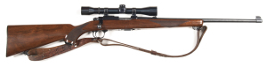 RUGER MOD. 77/22 B/A SPORTING RIFLE: 22LR; 10 shot rotary mag; 20 barrel; exc bore; standard sights plus fitted with a Weaver K 4-1 scope; marked RUGER 77/22 to side rail; sharp profiles & markings; rifle has a full blacked finish to barrel, receiver & 