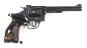 TAURUS MOD 76 TARGET REVOLVER: 32 Long; single action; 6 shot fluted cylinder; 153mm (6") round barrel; standard sights; g. bore; vg profiles & clear markings; retaining 85% original blue finish; fitted with adjustable wooden grips; all complete; gwo & vg