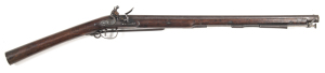 ENGLISH HORESMAN’S FLINTLOCK RIFLE by WOGDON: 25 bore: 24" swamped octagonal barrel with captive rod, swivel assembly repaired, gold vent, top flat engraved Wogdon LONDON; standard sights, 8 groove f. cond bore; stepped lock with bevelled edges, bolted sa