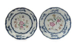 A pair of Chinese porcelain dishes with enamel floral decoration and underglaze blue borders, 18th century, ​12cm diameter