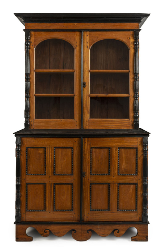 An Indo-Portuguese bookcase, teak and ebony with peg joint construction, Goan origin, early 19th century, 206cm high, 123cm wide, 50cm deep