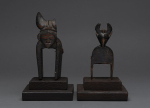 Two African weaving pulleys, carved wood, Baule tribe, Ivory Coast, on later wooden plinths (both loose), 14cm high overall