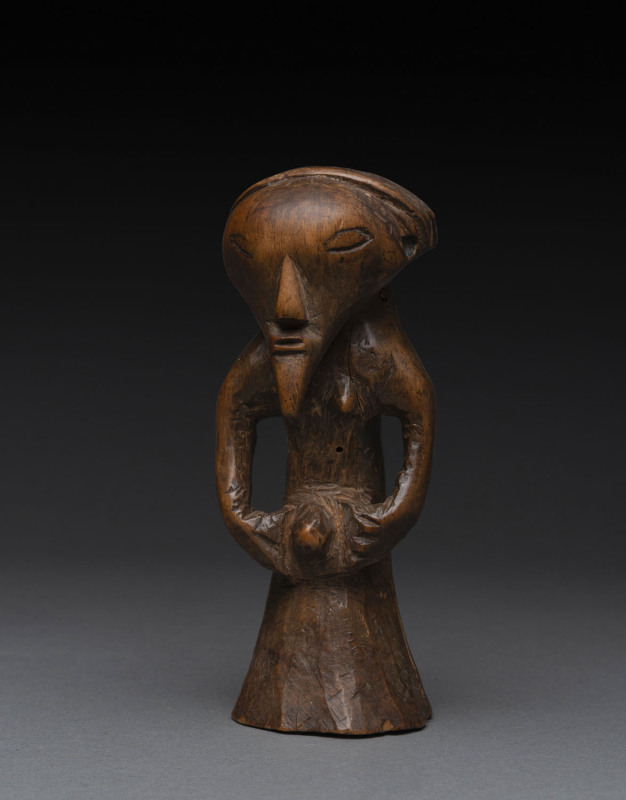 An African female fetish figure, carved wood, Basongye tribe, Southern Congo, 15.5cm high.