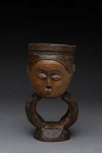 An African ceremonial face cup, carved wood, Bakuba tribe, Central Congo, 20.5cm high