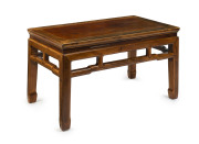 A Chinese timber occasional table, early to mid 20th century, ​50cm high, 91cm wide, 50 cm deep