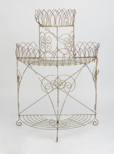 An antique wire work plant stand, circa 1910, 116cm high, 77cm wide, 39cm deep