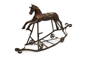 A rare antique pull-along rocking horse toy, carved wood and wrought iron, 19th century, 66cm high, 108cm long