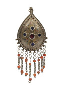 An antique eastern silver pendant set with coloured stones and coral tassels, Central Asian origin, 19th century, 14cm high
