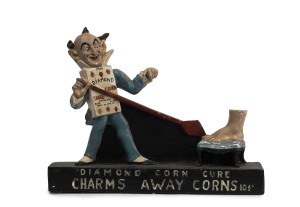 "THE DIAMOND CORN CURE" rare point of sale advertising statue, painted chalk ware, 19th century, ​48cm high, 61cm wide