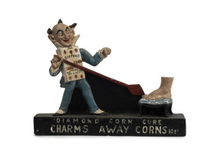 "THE DIAMOND CORN CURE" rare point of sale advertising statue, painted chalk ware, 19th century, 48cm high, 61cm wide