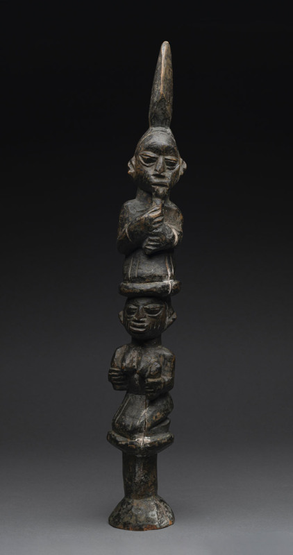 SHANGO STAFF, carved wood depicting two seated figures, Yoruba tribe, Nigeria, ​55cm high