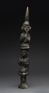 SHANGO STAFF, carved wood depicting two seated figures, Yoruba tribe, Nigeria, 55cm high