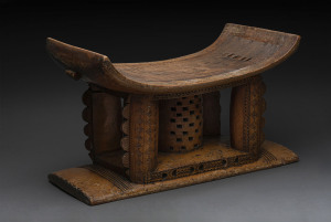 Chieftain or King's ceremonial stool, carved wood, Ashanti tribe, Ghana, 31cm high, 53cm wide, 27cm deep