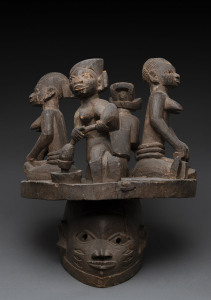 Gelede society mask topped with four figures, carved wood, Yoruba tribe, Nigeria, 55cm high, 41cm wide