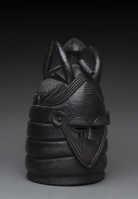 Bundu mask with crown and four horns, carved and patinated wood, Mendi tribe, Sierra Leone, ​41cm high