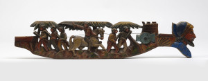 An antique military scene plaque, carved wood with polychrome finish, 19th century, 15cm high, 73cm wide