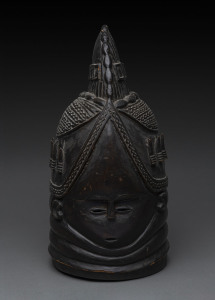 Bundu mask with single crest adorned with five squares on each side, carved and patinated wood, Mendi tribe, Sierra Leone, ​46cm high
