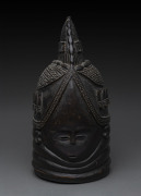 Bundu mask with single crest adorned with five squares on each side, carved and patinated wood, Mendi tribe, Sierra Leone, ​46cm high