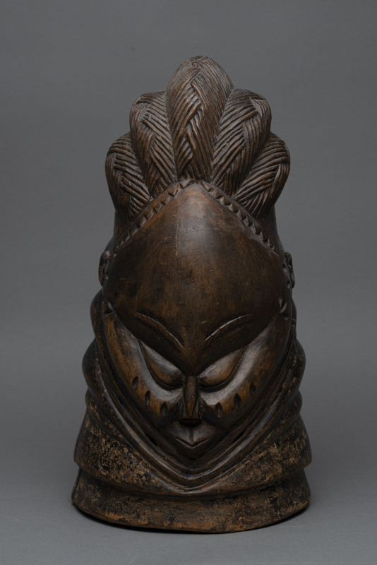 A Bundu mask, carved wood, Mendi tribe, Sierra Leone, ​43cm high