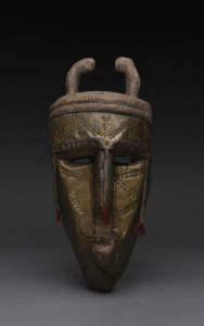A dance mask, carved wood overlaid with copper and cotton, Marka tribe, Mali, 33cm high