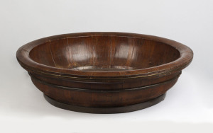 A Chinese rice container, coopered timber construction with brass bindings, 20th century, 23cm high, 77cm diameter