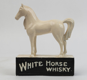 "WHITE HORSE WHISKY" point of sale advertising statue, painted chalk ware, late 19th early 20th century, 24cm high, 21cm long
