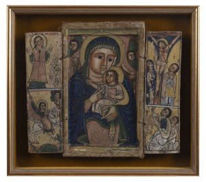 An Ethiopian Coptic Christian triptych icon of Mary and Jesus, 17th century, in later box mount frame, 33 x 37cm, 42 x 47cm overall