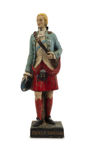 "PRINCE CHARLES DRAMBUIE LIQUEUR" point of sale advertising statue, painted compound rubber, early 20th century, 41cm high