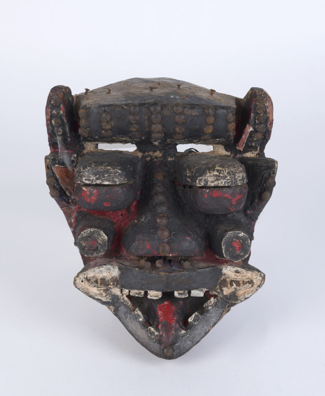 Poro mask, carved wood studded with brass and iron nails with painted finish, Dan-Guere tribe Ivory Coast, ​26cm high