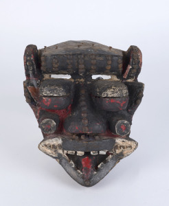 Poro mask, carved wood studded with brass and iron nails with painted finish, Dan-Guere tribe Ivory Coast, 26cm high