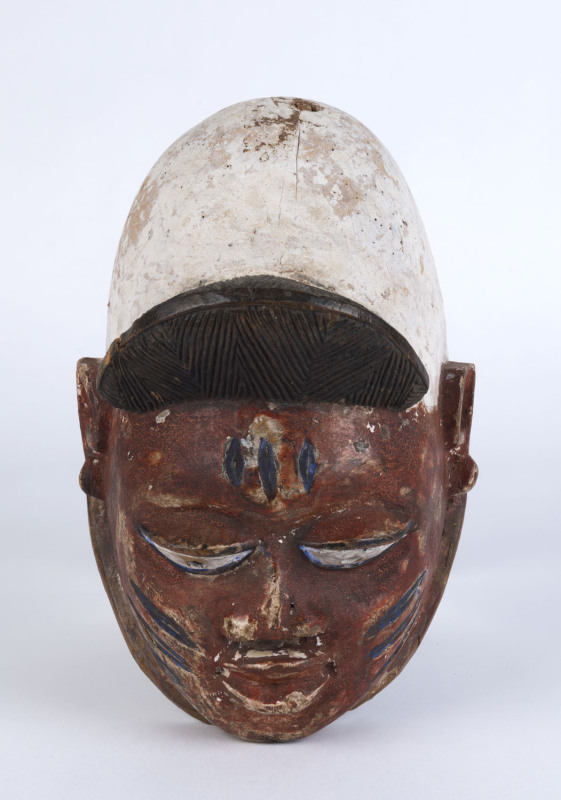 Gelede mask, carved wood with polychrome finish with white headpiece and eyes, Yoruba tribe, Nigeria, 30cm high