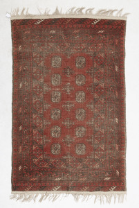 A red Turkoman rug (very worn), 130 x 81cm