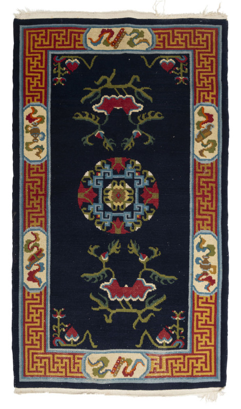 A Chinese hand-woven rug, early to mid 20th century, 170 x 95cm